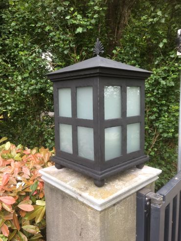 Stuart Rattle designed pier light , hand made wrought iron for The Garden at Broughton Hall 