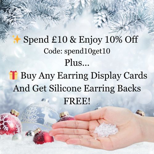 Christmas scene hand holding silicone earring backs promoting free offer with earring card purchase