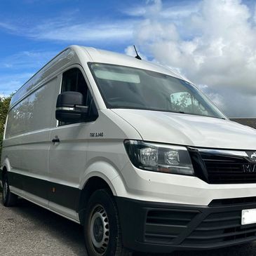 white, vw, man crafter tge blue sky clouds clean van front drivers corner low image daneside solutio
