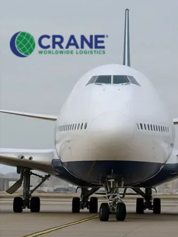 Front view of a large cargo airplane with Crane Worldwide Logistics logo.