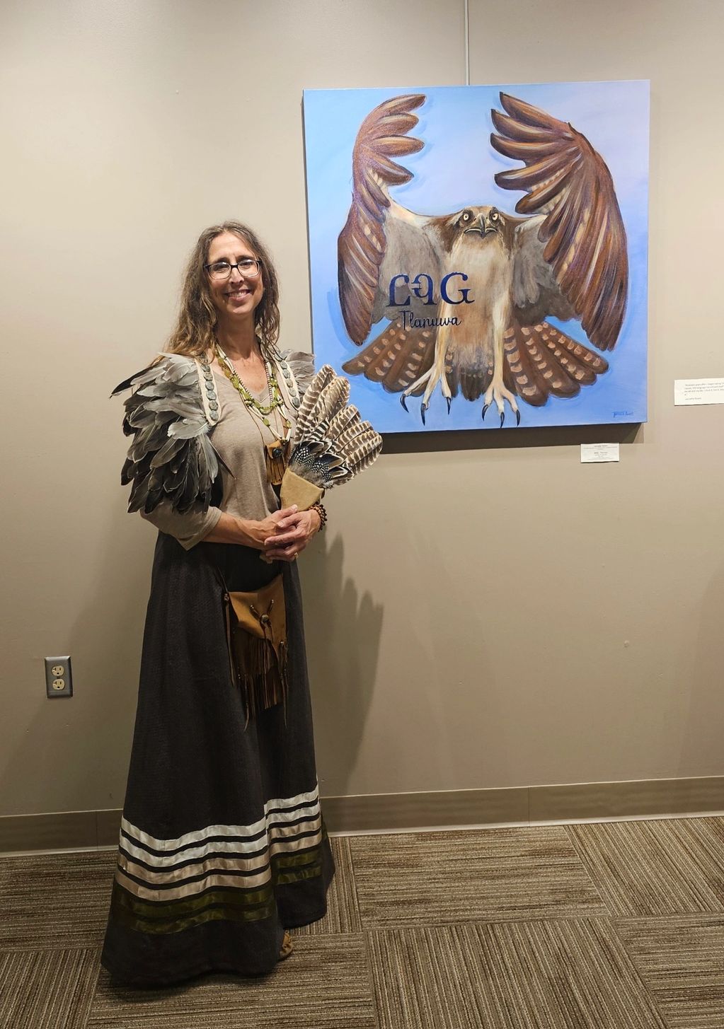 Jannette Parent wearing her regalia