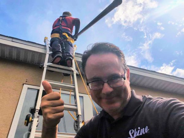 Solar panel cleaning is ladder work. Don't do it! We have crews that love to be up high.