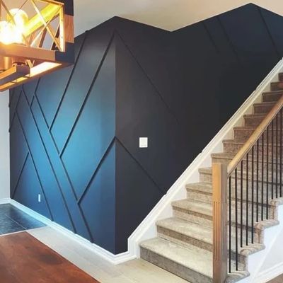 Custom contemporary wood paneling with a beautiful satin black finish. Truly brings out the beautifu