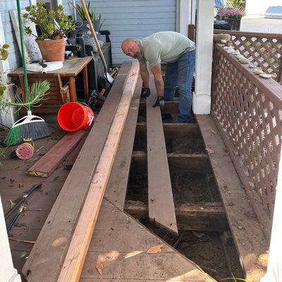 Hometown handyman is in the middle of repairing the deck boards. You can check out the finish produc