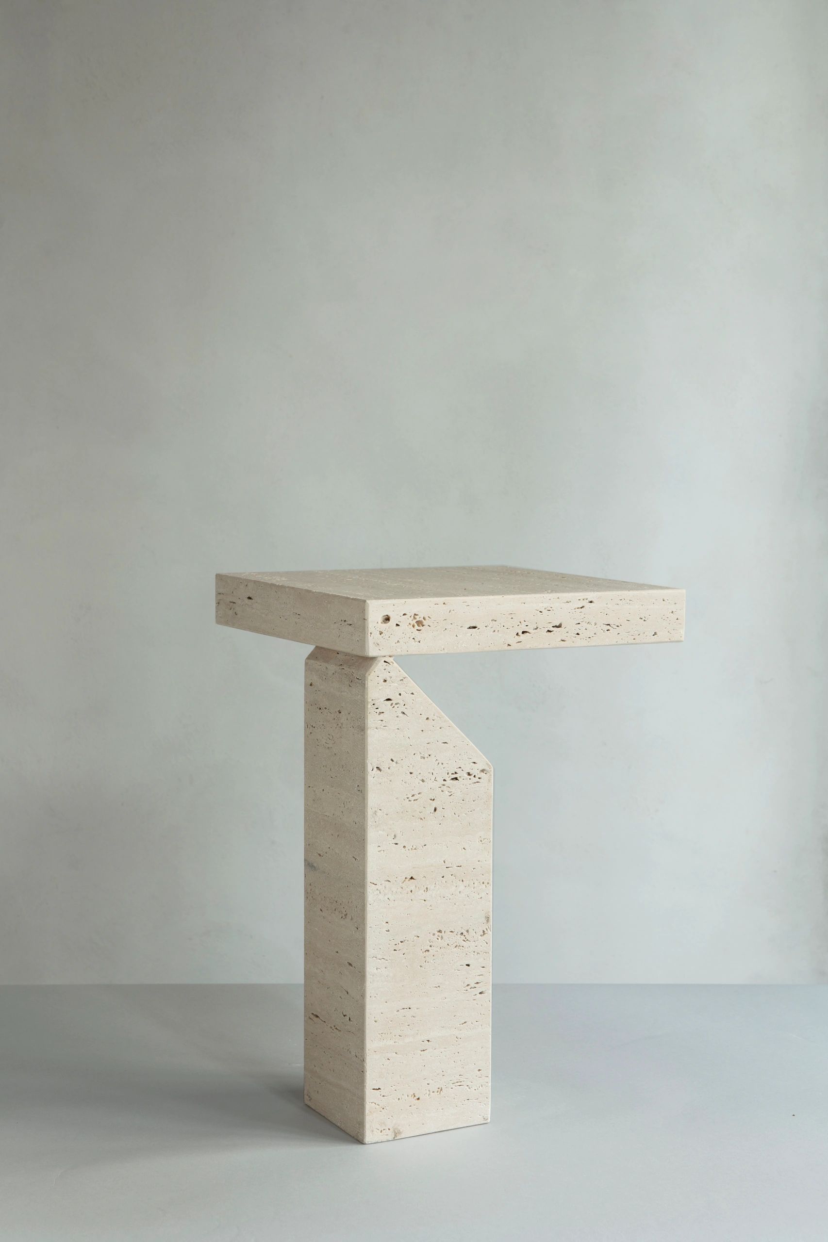 dam atelier travertine stone collectible table