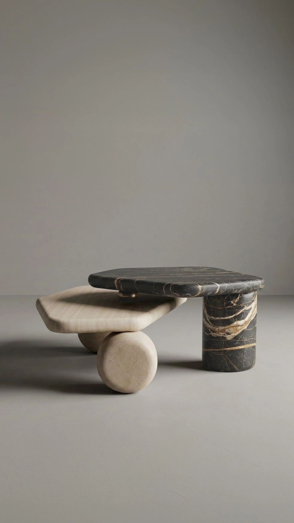 Modern hexagonal marble tables with geometric supports in black and beige.