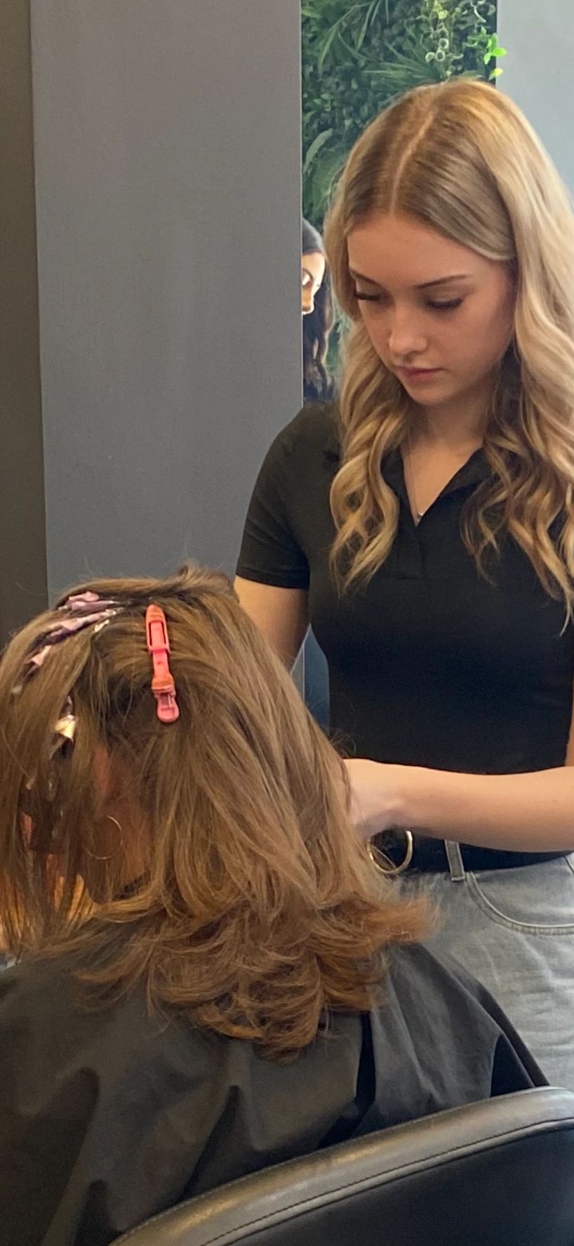 Kiara colouring a clients hair 