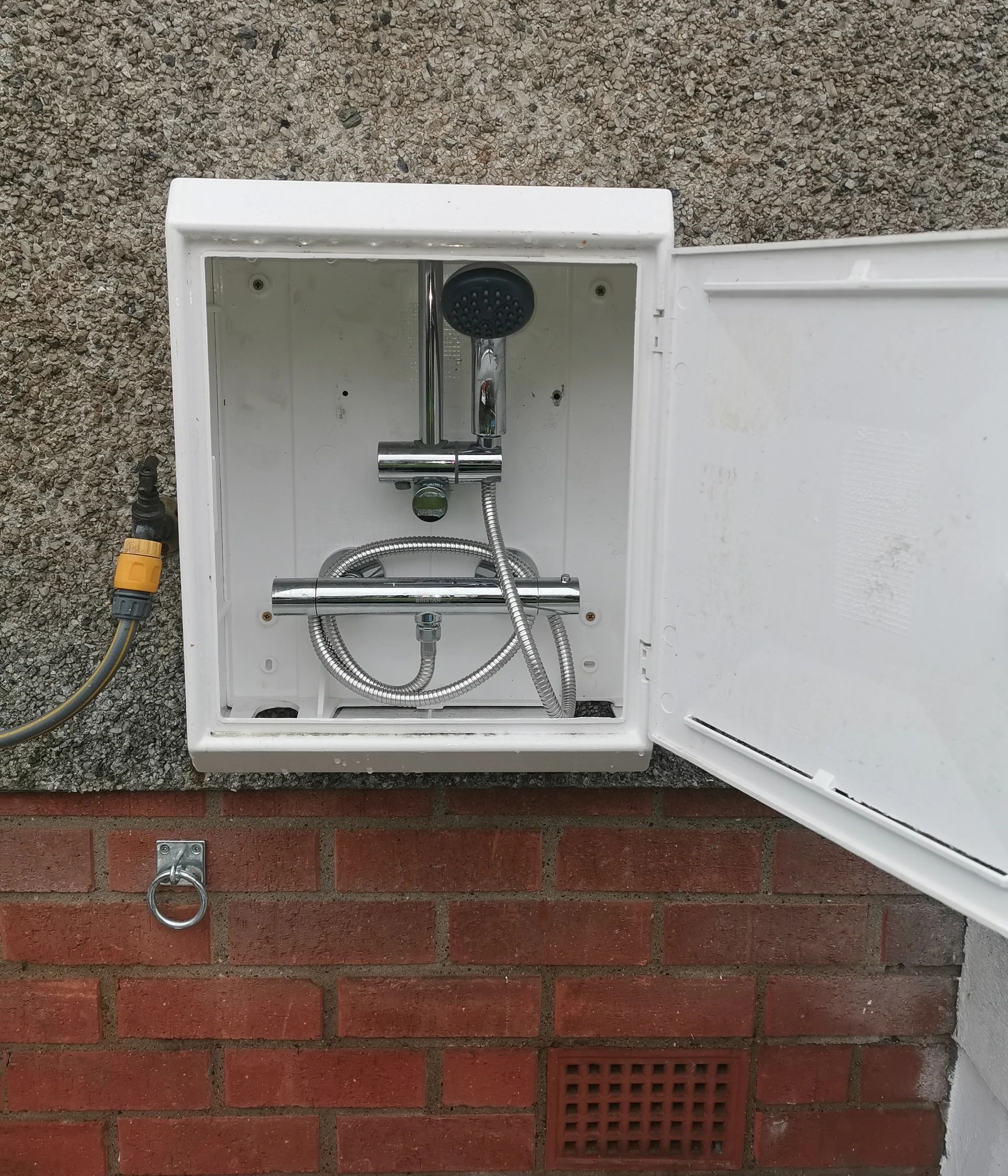 How Do You Shower A Dog Outside