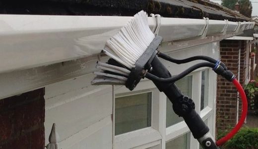 house washing and gutter scrub with pressure washing