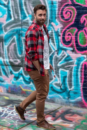 Actor in graffiti alley.