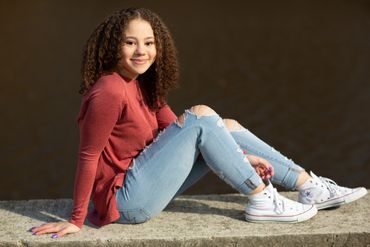 Aspyre Productions Senior portrait. Girl on a ledge.