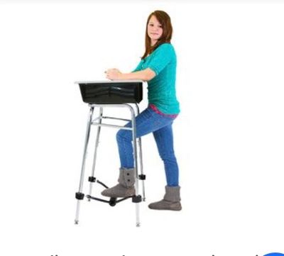 An ergonomic standing desk can help with sitting issues, plus lets you prop a foot up for greater co