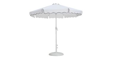 White outdoor patio umbrella with scalloped edges and a round base.