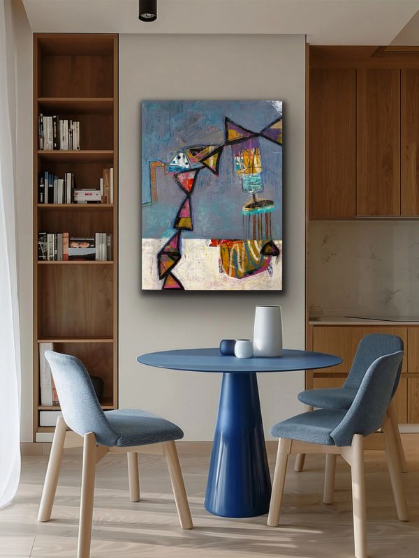 Modern dining area with abstract art on wall.