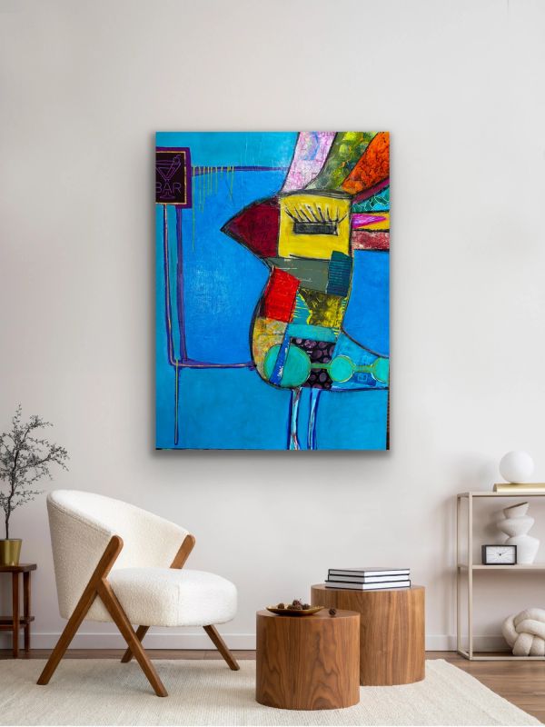 Colorful abstract bird painting on a wall.