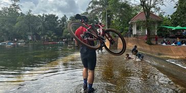 Crossing Khlong Root with bicycle