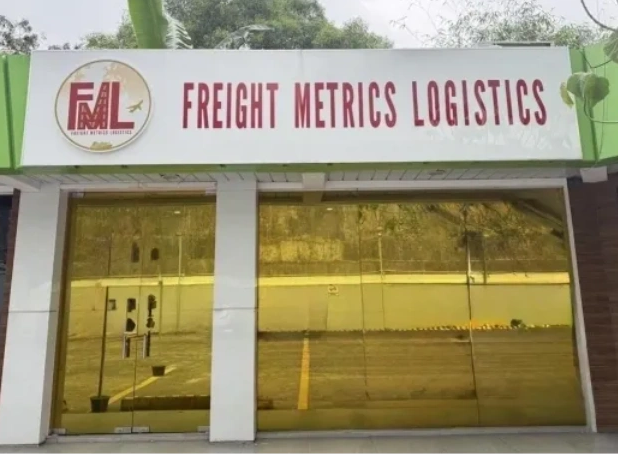 Front view of Freight Metrics Logistics office with reflective glass doors.