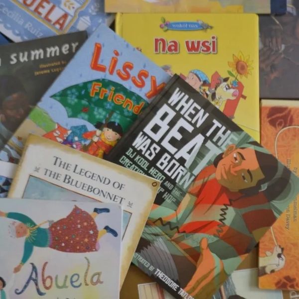 A collection of diverse children's books with colorful covers and various themes.