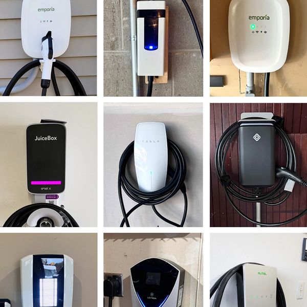 Nine different electric vehicle charging stations mounted on walls with cables.