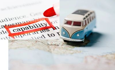 Red marker highlighting 'capability' and a miniature bus on a map.