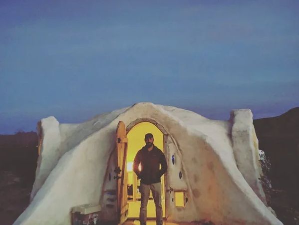 Trevor Reichmann outside his AirBnB rental (Domeland) off Terlingua Ranch Road. 