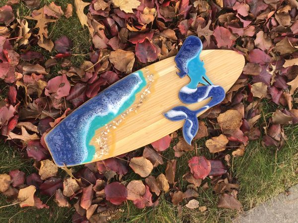 Bamboo surfboard and mermaid 