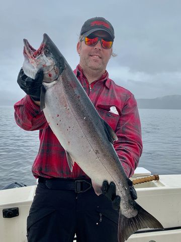 Big Coho hitting the deck onboard Reel Alaska Fishing Charters in Ketchikan Alaska 