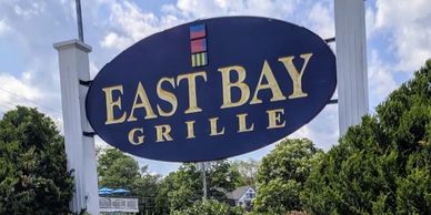Sign for East Bay Grille restaurant.