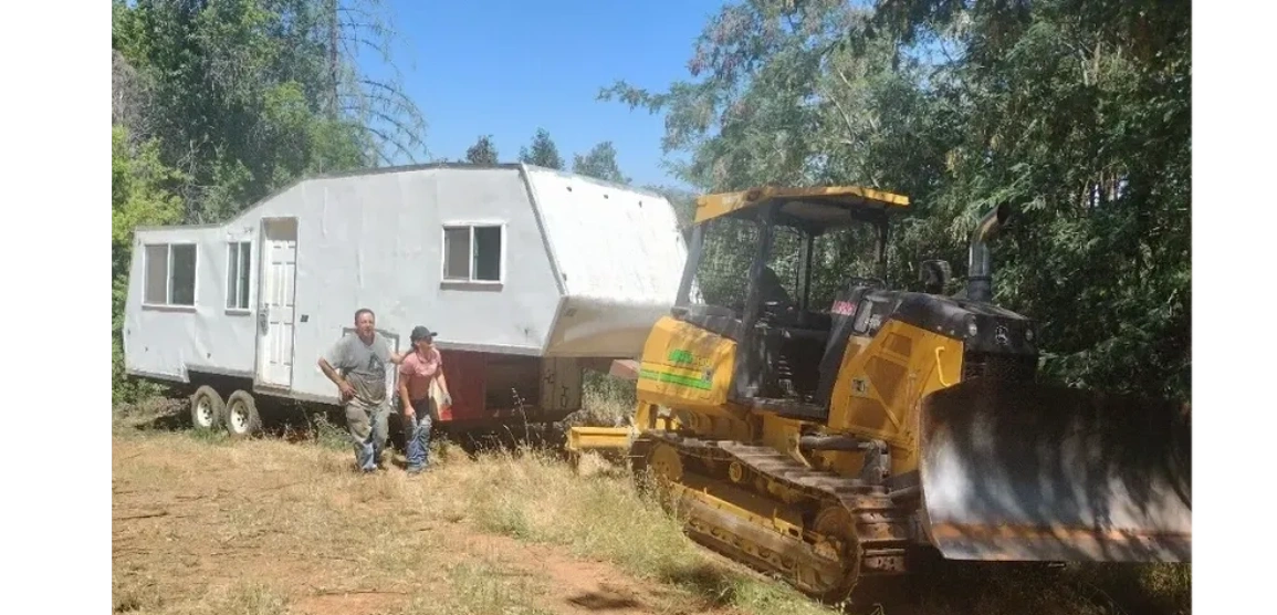 Professional RV and trailer moving service using heavy equipment for difficult access locations