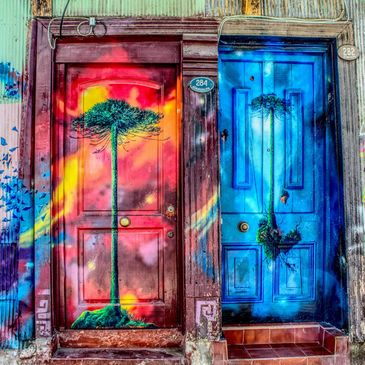 colorful red and blue painted doors with tree art-Ocala counseling and therapy imagery
