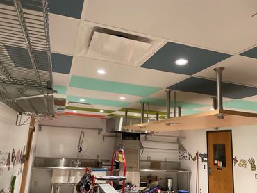 ChromaTints custom-painted acoustic ceiling tiles from Chroma Collections