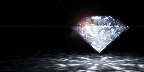 Shiny diamond on black background. Image credit: radivoje - stock.adobe.com