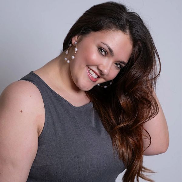 woman smiling in business elle wilks powerhouse life coaching course leader self-discovery south wal