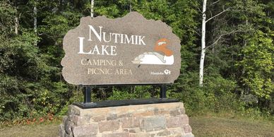 Sign for Nutimik Lake Camping & Picnic Area in Manitoba.