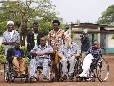 Jackson and colleagues in their chairs on the prison grounds