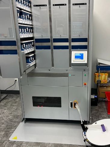 RxComplete's High Tech pouch and vial filling systems in action.