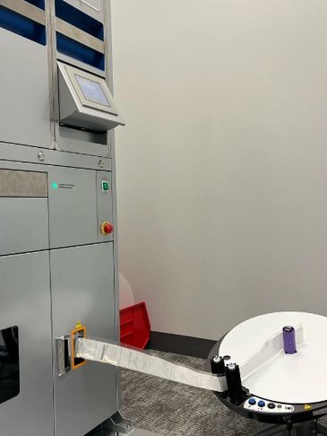 RxComplete's High Tech pouch and vial filling systems in action.