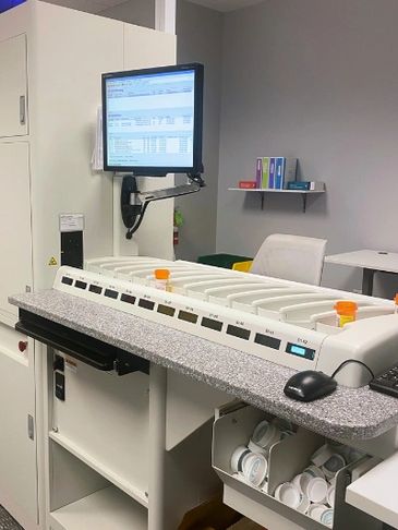 RxComplete's High Tech pouch and vial filling systems in action.