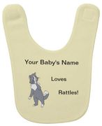 The design on this baby bib is inspired by the book series, "Rattles, the Barn Cat."