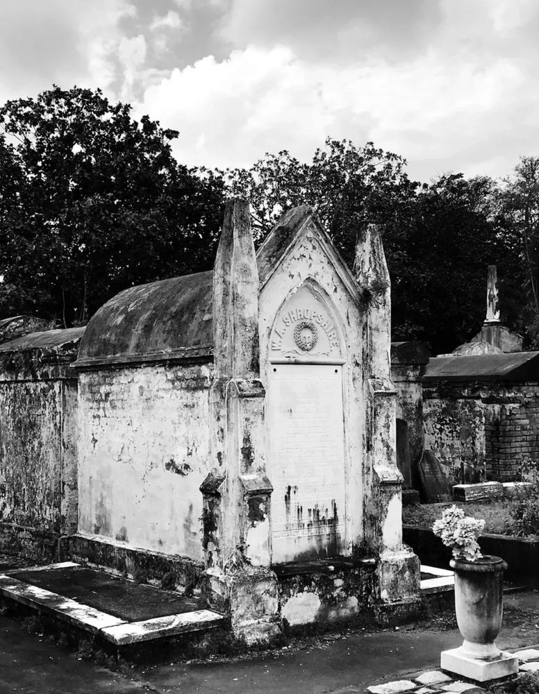 A black and white image of a crypt.