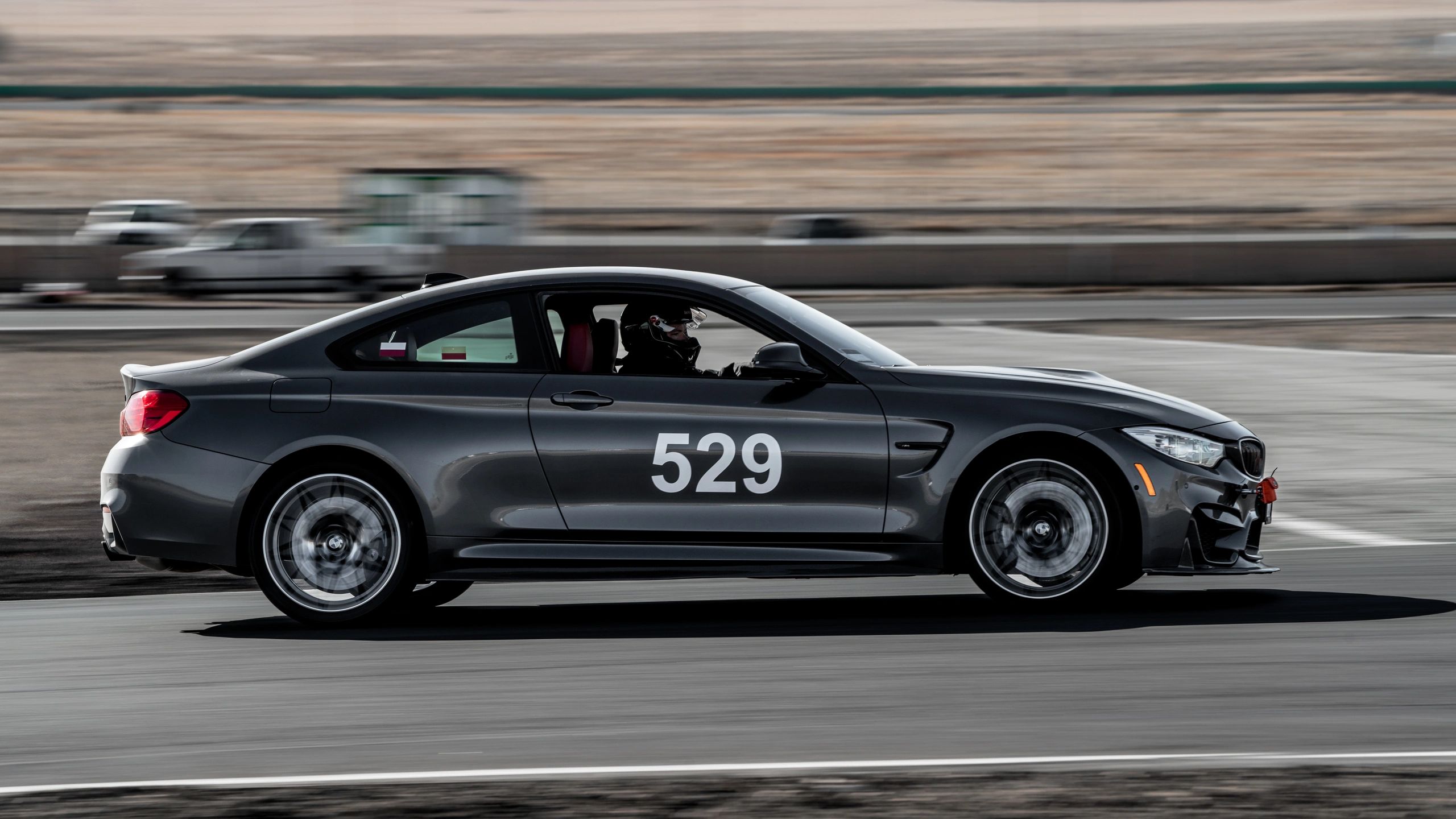 BMW Car on the track driving at the famous Willow springs international raceway 