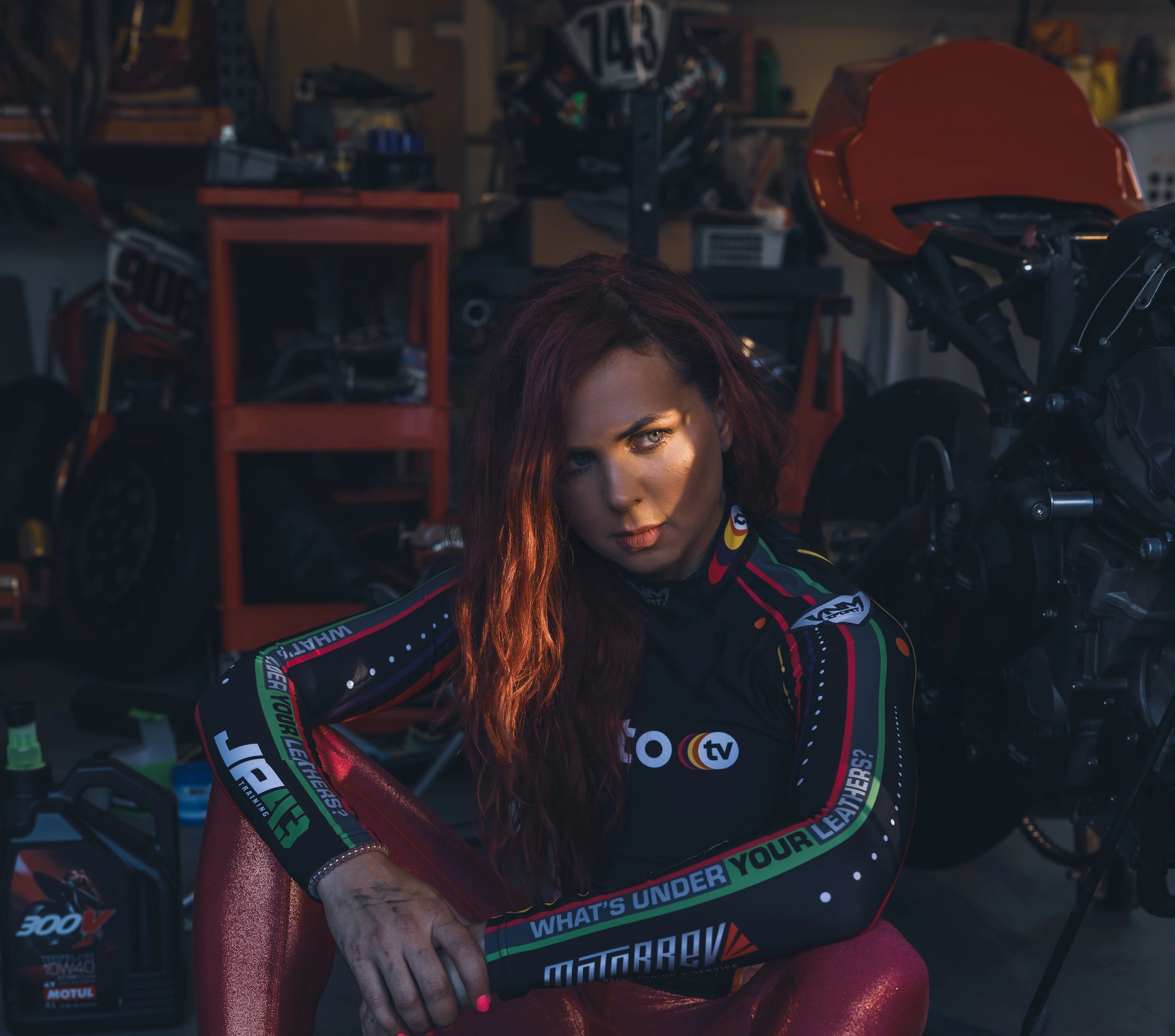 Female Mechanic working on her motorcycle