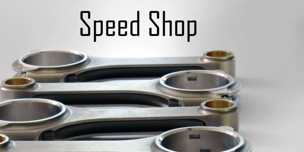 Metal connecting rods displayed with 'Speed Shop' text above.