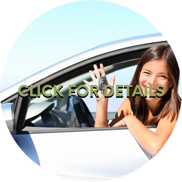 Happy woman showing car keys through open window.