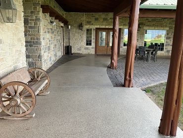 Commercial concrete patio resurfaced with PolyChip flake system for garage floors.