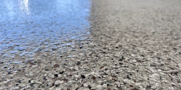 Garage floor system with Polyaspartic top coat and Polyurea base coat. Premium garage floor system.