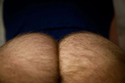 Man wearing bright blue shirt