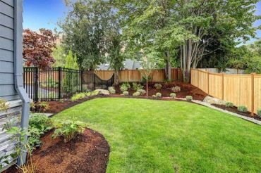 Backyard makeover with mulch and fresh sod