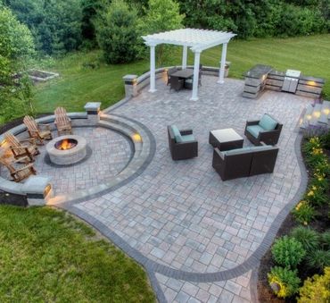 Pergola on a paver patio with a firepit