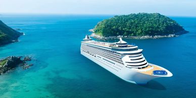 cruise ship near island.